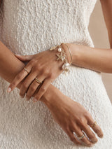 BaubleBar Isla Charm Bracelet - Gold/Pearl - 
    Shell and pearl charm bracelet
  
